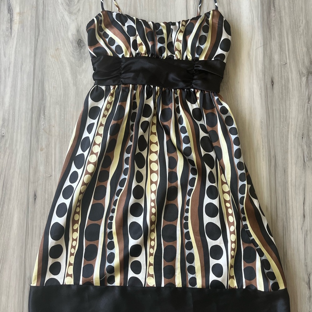 Brown, gold, white stripped polka dot dress. Spaghetti strap. 100% polyester.
